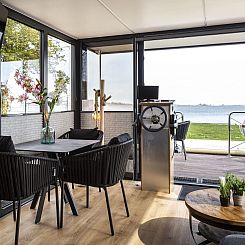 Houseboat 'Iere Fügel' met tuin en 2 SUP's - Paviljoenwei 4