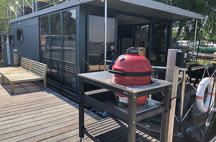 Houseboat 'Iere Fügel' met tuin en 2 SUP's - Paviljoenwei 4