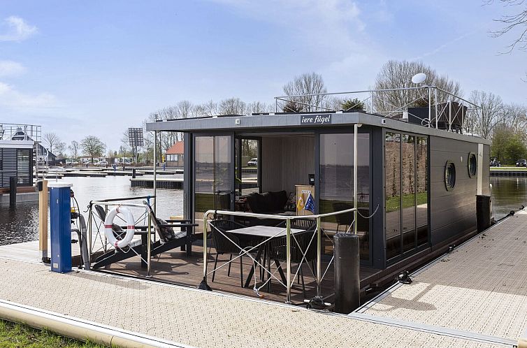 Houseboat 'Iere Fügel' met tuin en 2 SUP's - Paviljoenwei 4