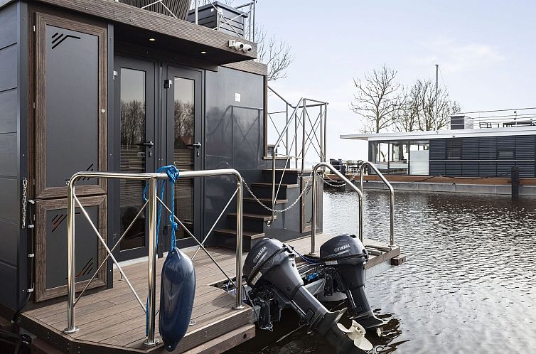 Houseboat 'Iere Fügel' met tuin en 2 SUP's - Paviljoenwei 4