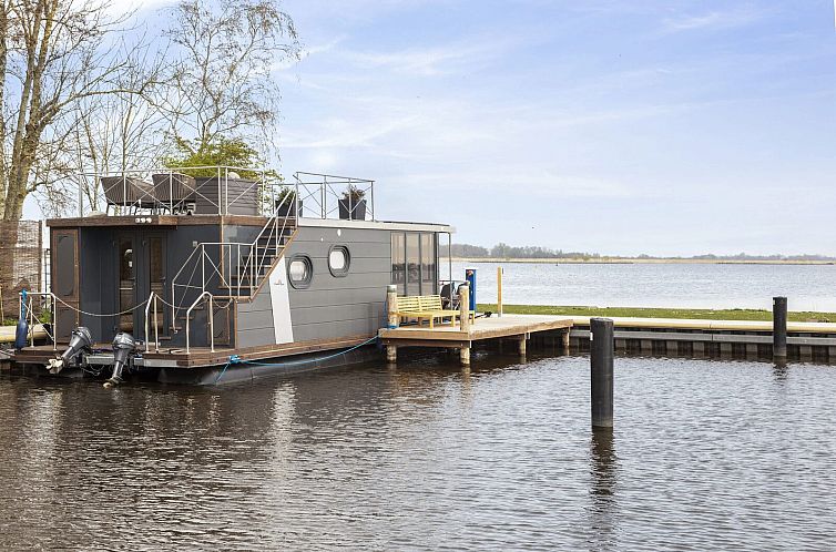 Houseboat 'Iere Fügel' met tuin en 2 SUP's - Paviljoenwei 4