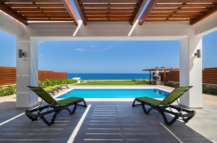 Antonoglou Beach Villas - Waterfront Luxury Retreat