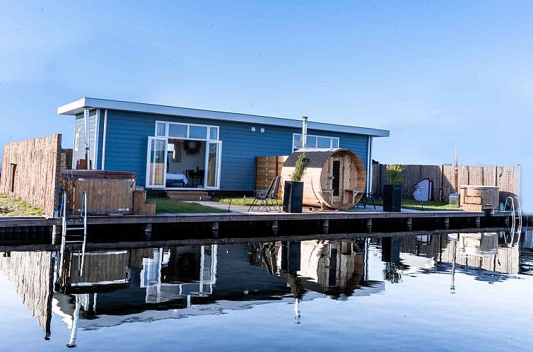 Luxe 2 persoons Tiny House met Hottub en Sauna aan de