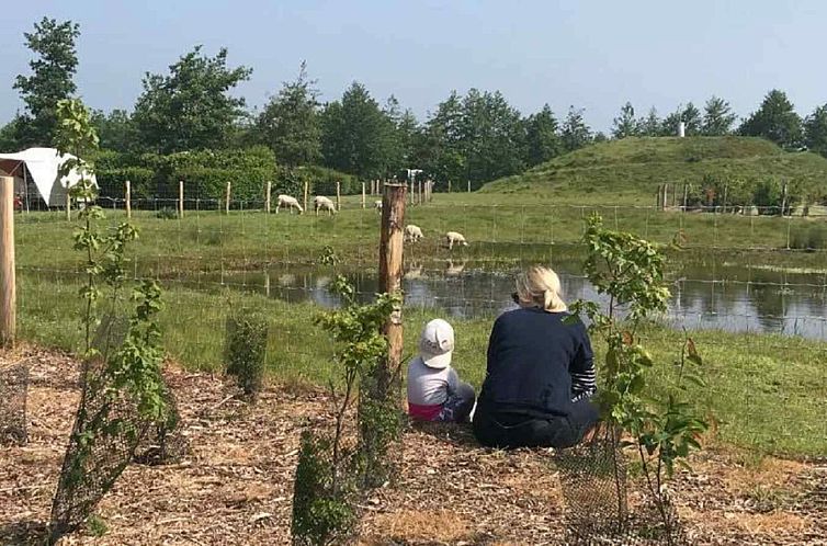 Gezellige 6-persoonswoning met ruimte tuin vlakbij het