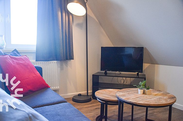 Modern 4-persoons appartement met sauna dichtbij zee en