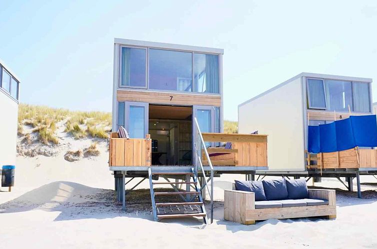 Uniek logeren op het strand in 5-persoons slaapstrandhuisje