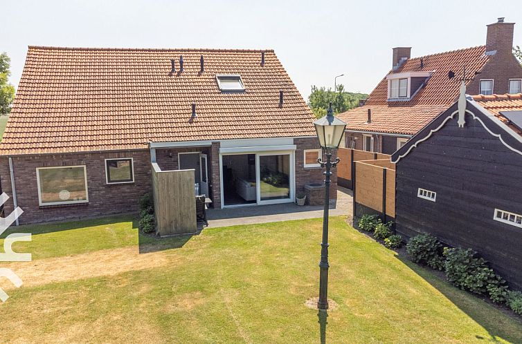 Fijn 4-persoons vakantiehuis met duinzicht en grote tuin in