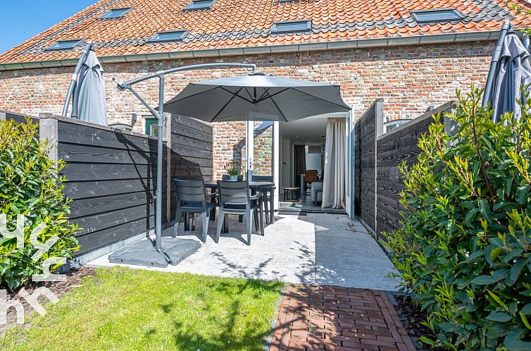 4-persoons woning met whirpool ligbad en tuin op het zuiden