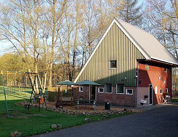 Mooi 12 persoons vakantiehuis midden in het bos in Drenthe