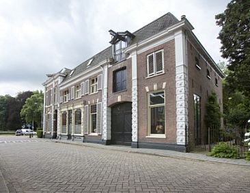 huis met de leeuwenkoppen