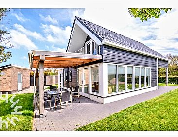 Moderne 6-persoons bungalow onderaan de duinen en op