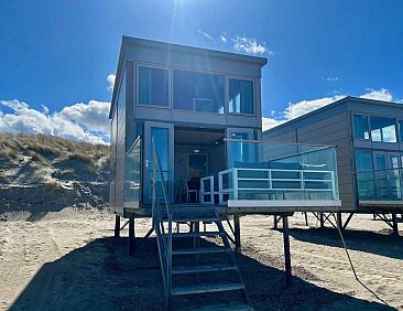 Uniek logeren op het strand in 5-persoons slaapstrandhuisje