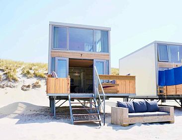 Uniek logeren op het strand in 5-persoons slaapstrandhuisje